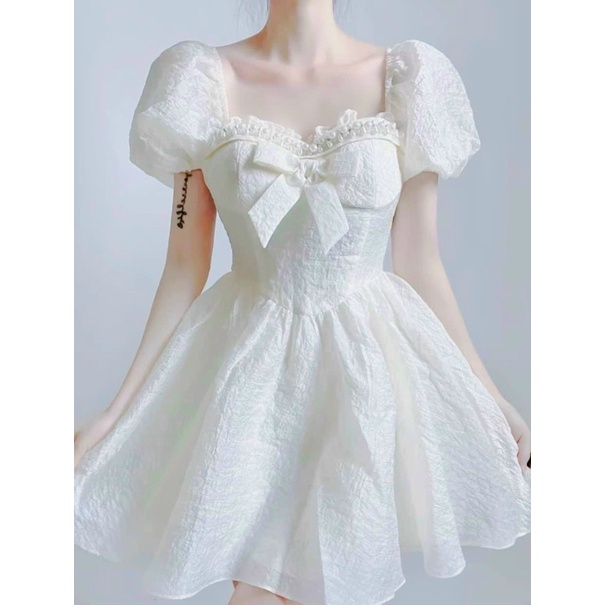 Đầm xốp VIỀN NGỌC NƠ NGỰC NUDE TAY PHỒNG
