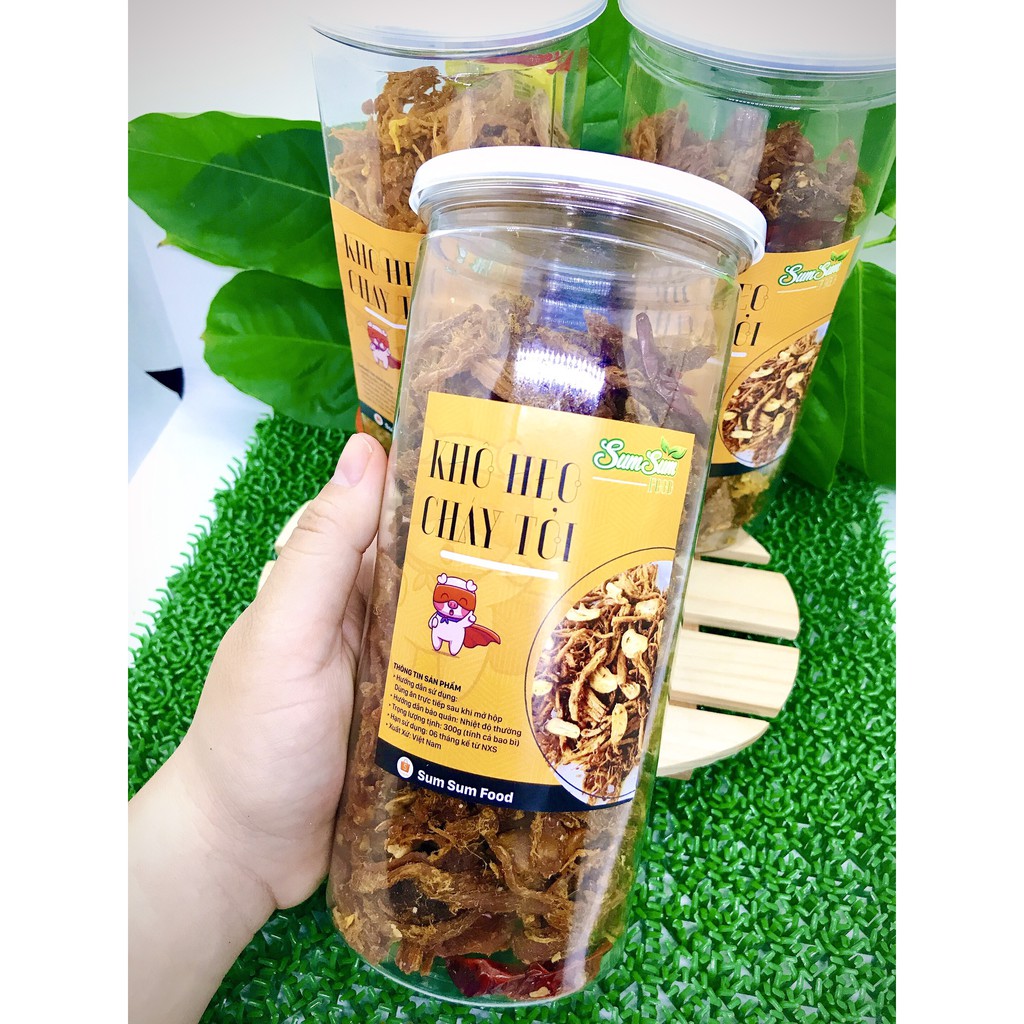 Khô Heo Cháy Tỏi Lon Pet 300g Sạch Chất LượngKhô Heo Nguyên Chất 100% và Không Phẩm Màu Hóa Chất