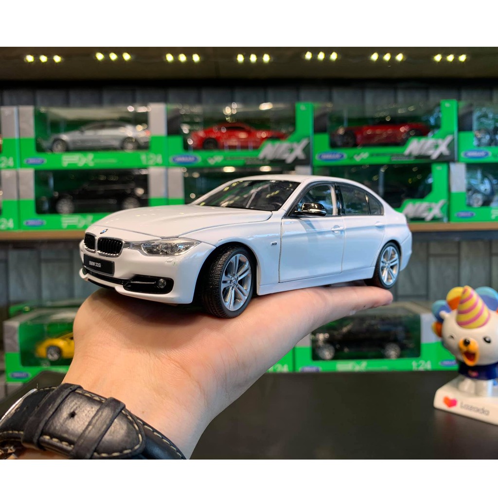 [Mã TOYDEC hoàn 20K xu đơn 50K] Xe mô hình hợp kim siêu xe BMW 335i tỉ lệ 1:24 hãng Welly màu trắng