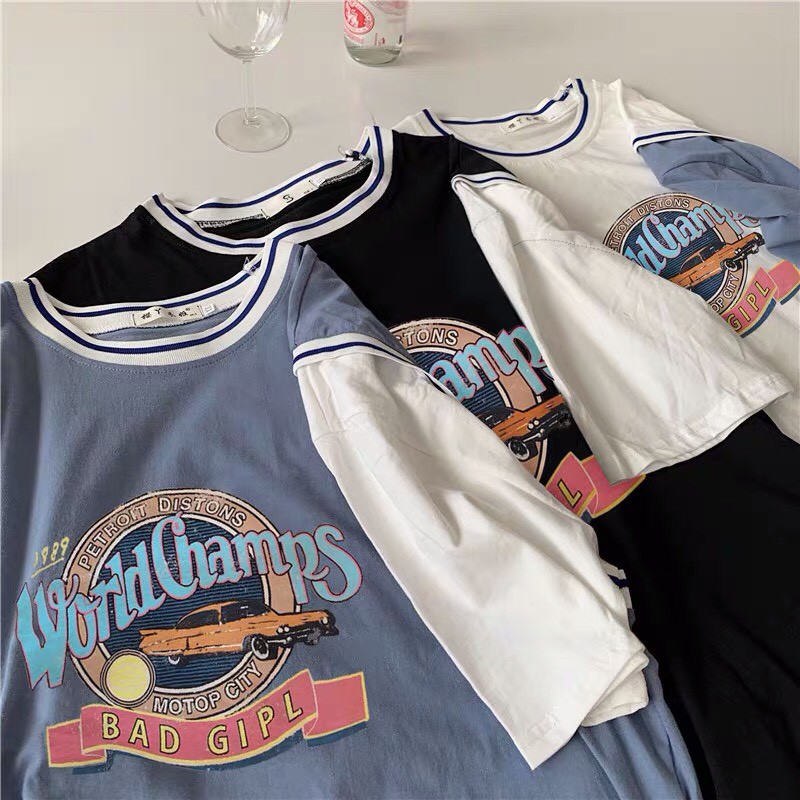 Áo thun form thụng tay lỡ phong cách ulzzang phối màu in chữ WORLD CHAMPS