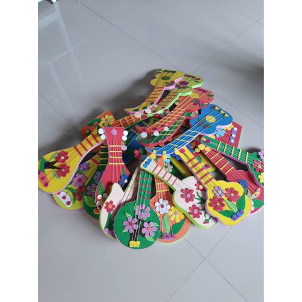 Đồ dùng mầm non đàn trang trí