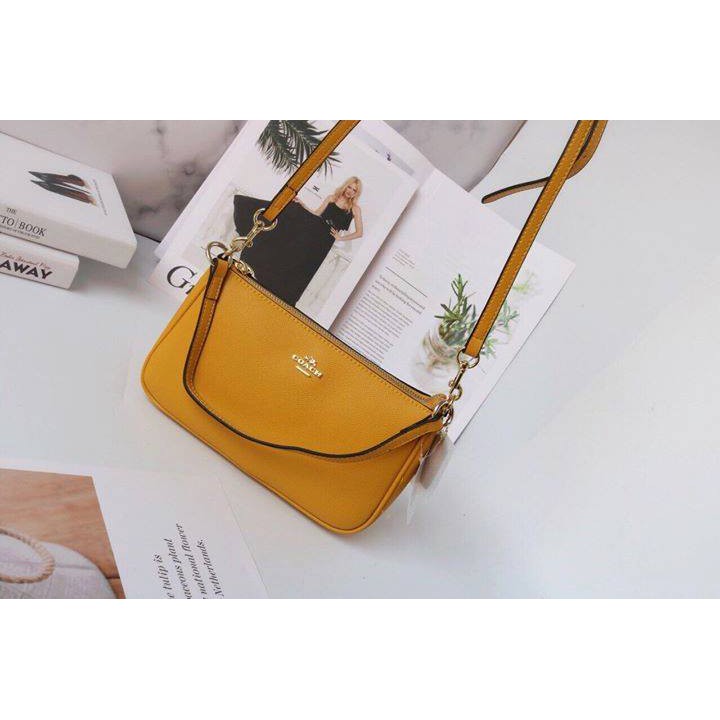 Túi coach mini vàng