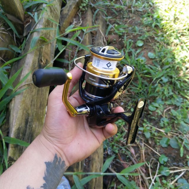 Máy câu cá Shimano nasci 2500