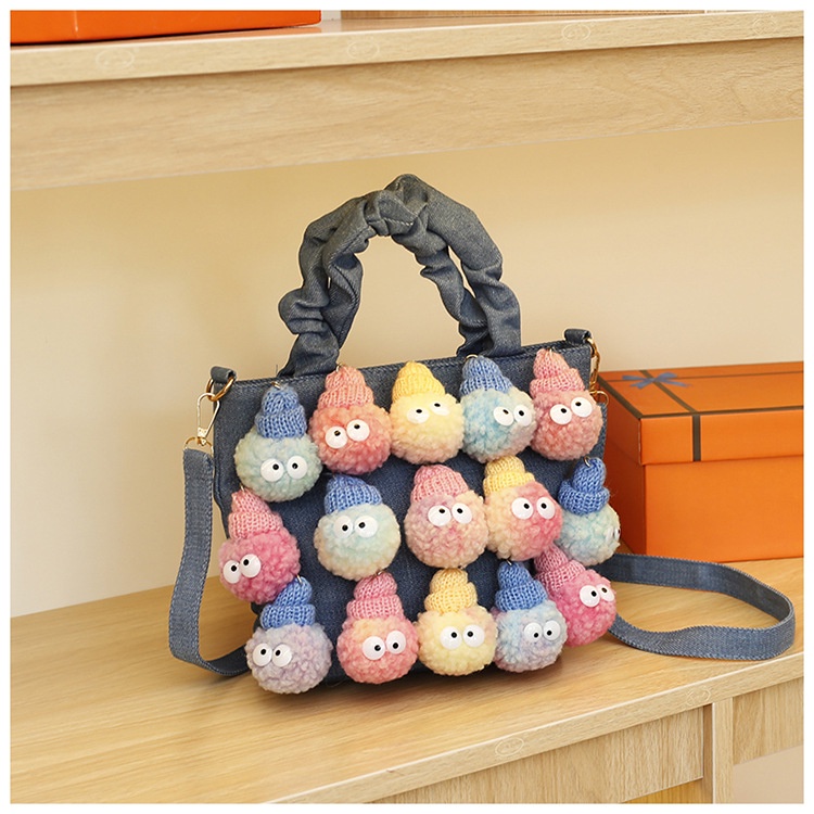 Túi xách gắn búp bê nhồi bông đáng yêu cho nữ