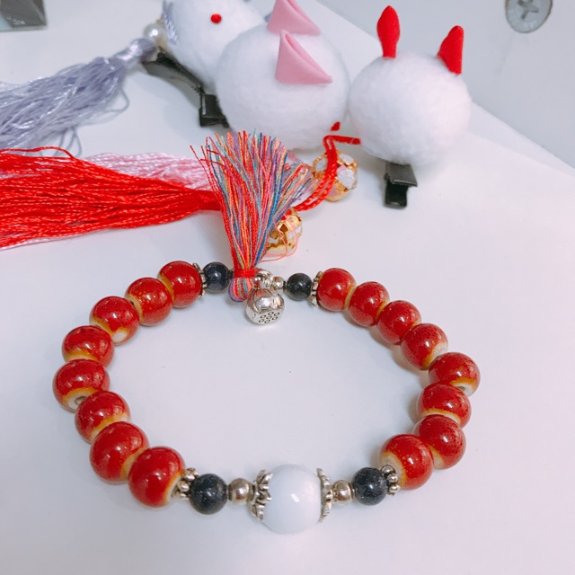 Vòng tay ngọc miêu charm hoa sen đá