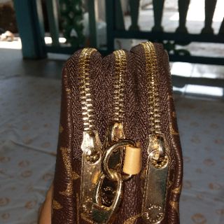 Cơm boTúi đeo chéo mini hiệu LV
