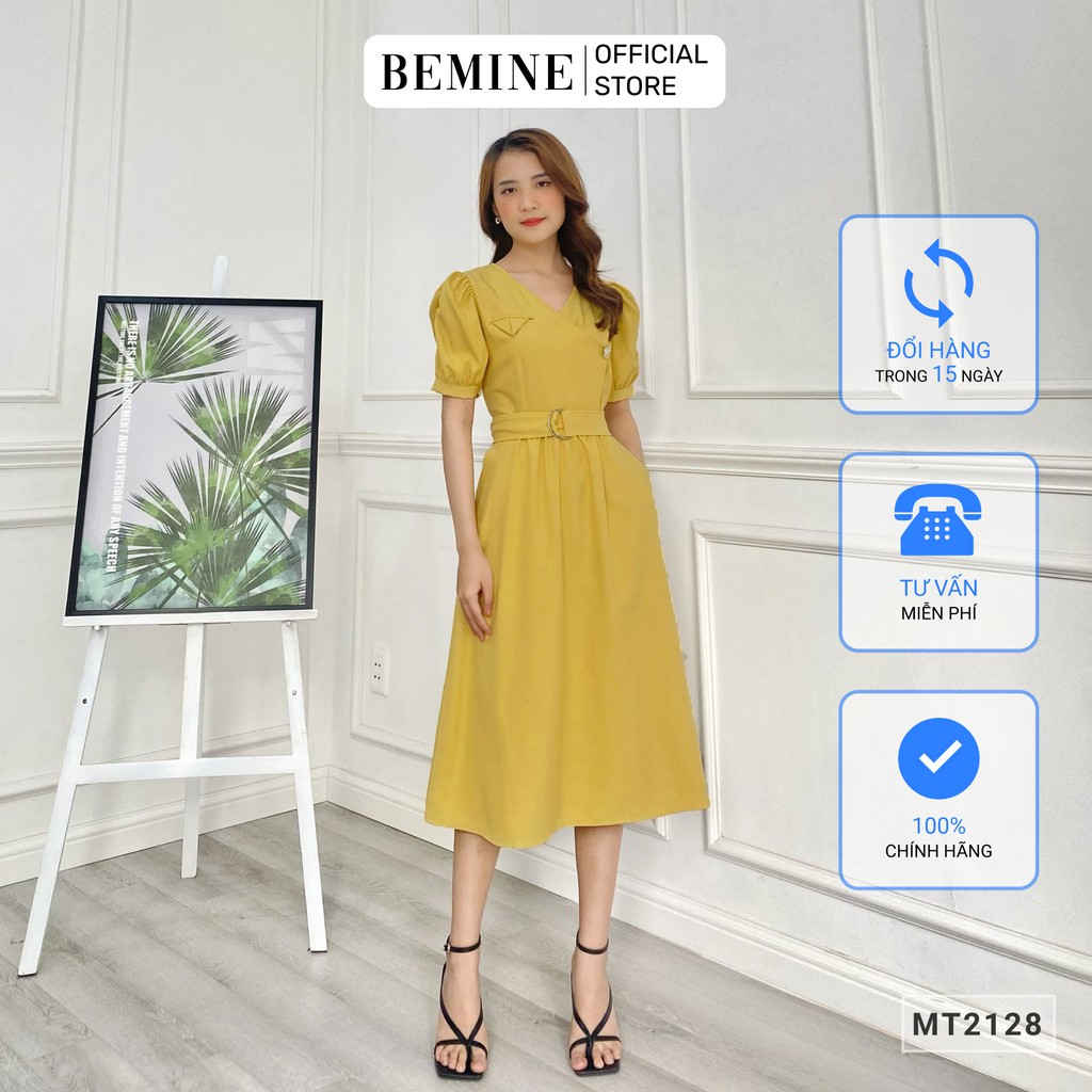 Đầm nữ công sở kiểu dáng cổ chéo thắt đai eo BEMINE MT2128VANG