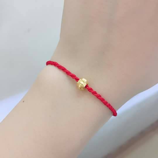 Dây chỉ đỏ bi vàng