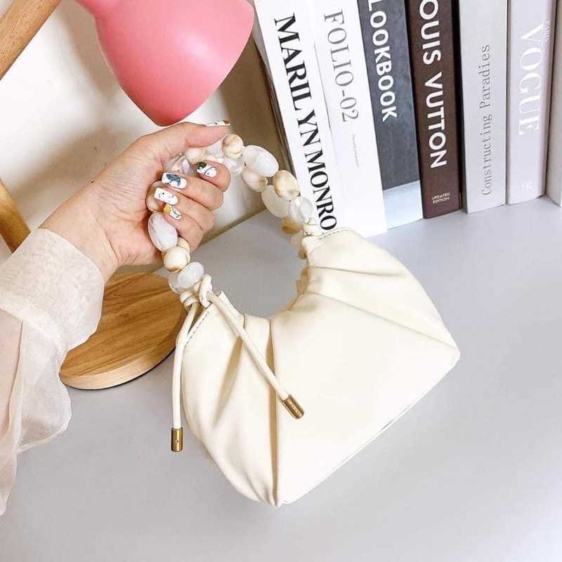 Túi cnk tay cầm đá đeo chéo