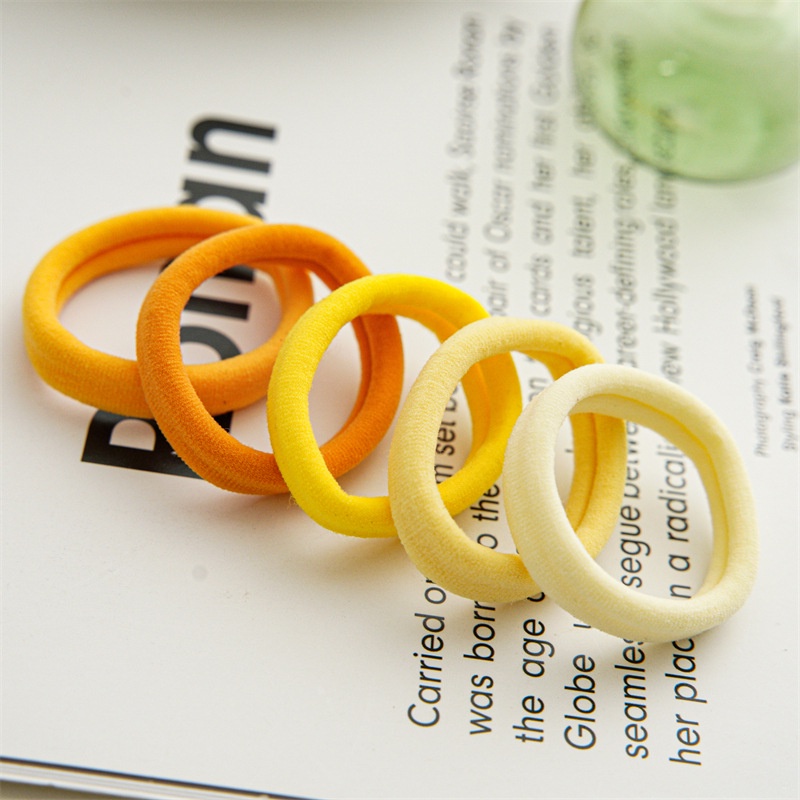 Dây Buộc Tóc Co Giãn Đính Nơ Màu Vàng Kẹo Dễ Phối Đồ Thời Trang Cho Nữ