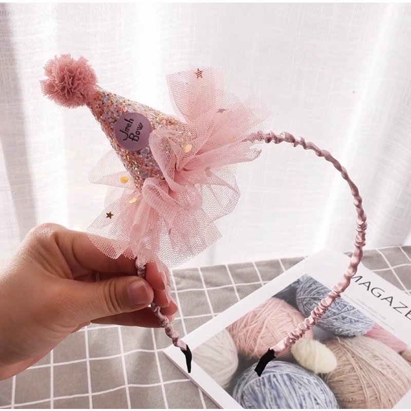 Cái tóc cho bé kiểu mũ sinh nhật