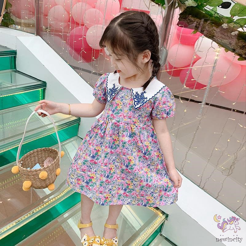 Đầm Công Chúa In Hoa Hở Lưng Cho Bé Gái