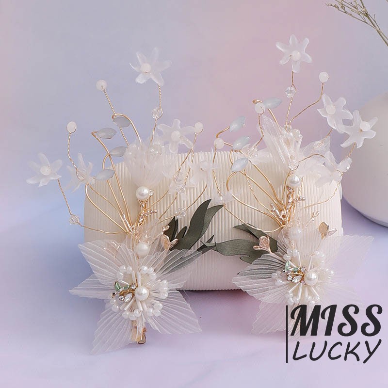 Khuyên tai và kẹp tóc cô dâu thời trang thanh tú