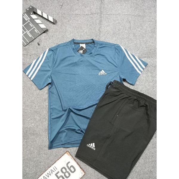 Bộ thể thao áo thông hơi kết hợp quần gió giãn thích hợp vào ngày hè nắng (ẢNH SHOP TỰ CHỤP )