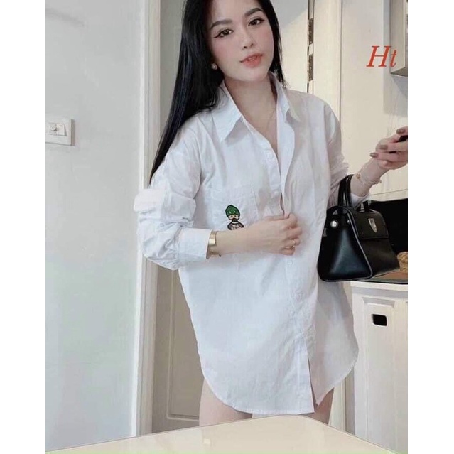 Áo sơ mi trắng dài tay vịt mũ xanh Ht