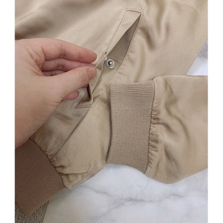 Áo bomber lụa túi bấm