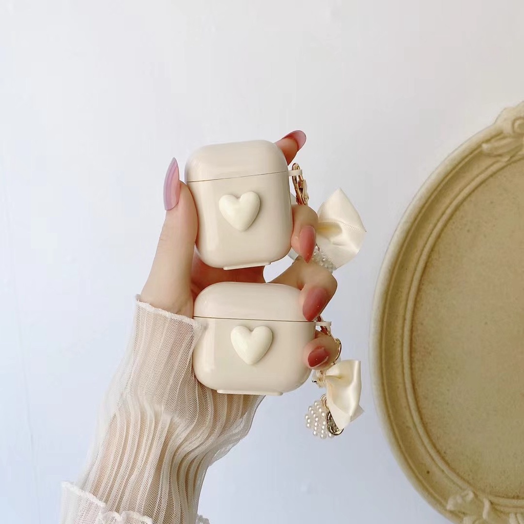 Vỏ Bảo Vệ Hộp Sạc Tai Nghe airpods 1 2 pro Bluetooth Bằng tpu Mềm Gắn Dây Ngọc Trai Và Trái Tim