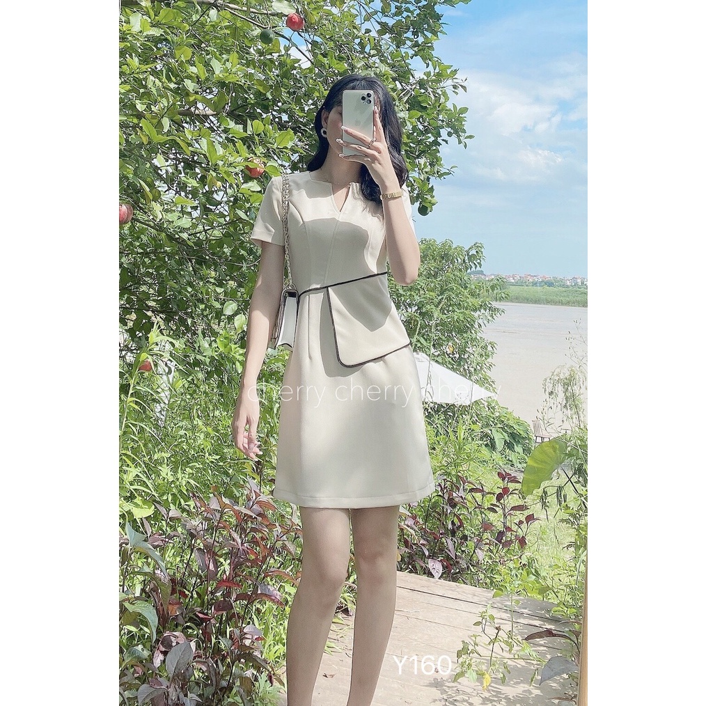 Váy văn phòng cổ V vạt eo tôn giáng tự tin