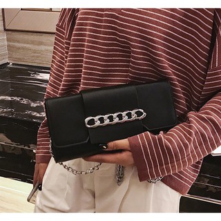 Clutch cầm tay dây xích