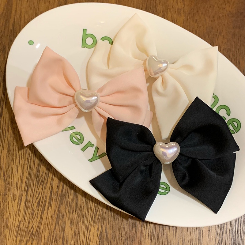 Kẹp Tóc Hình Nơ Màu Laser Đính Ngọc Trai Thời Trang Mùa Hè 1 Cái Cho Nữ