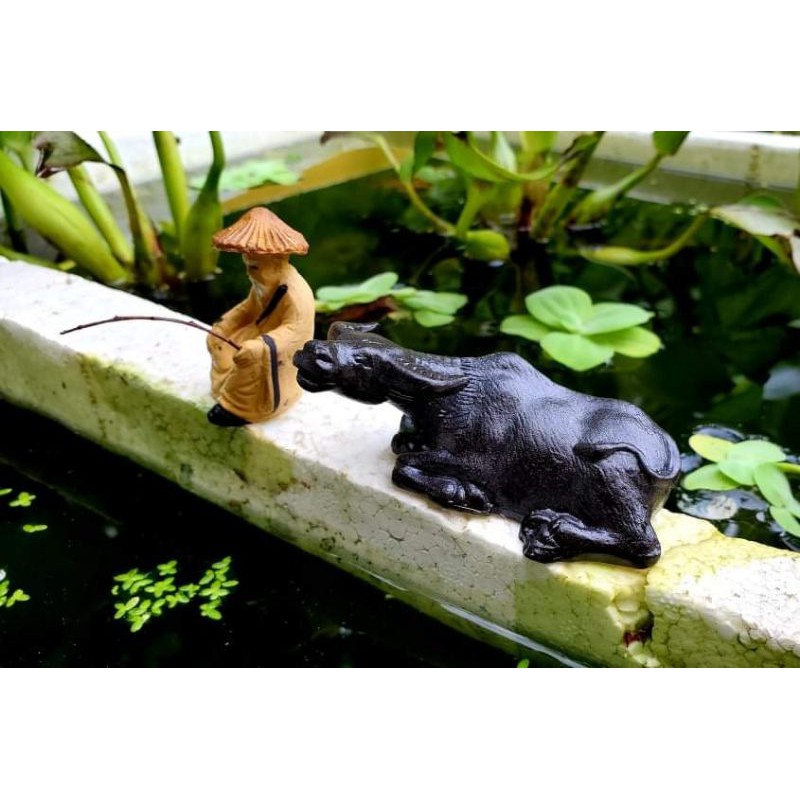 Tượng trâu nằm phơi nắng - phụ kiện trang trí hòn non bộ, tiểu cảnh bộ