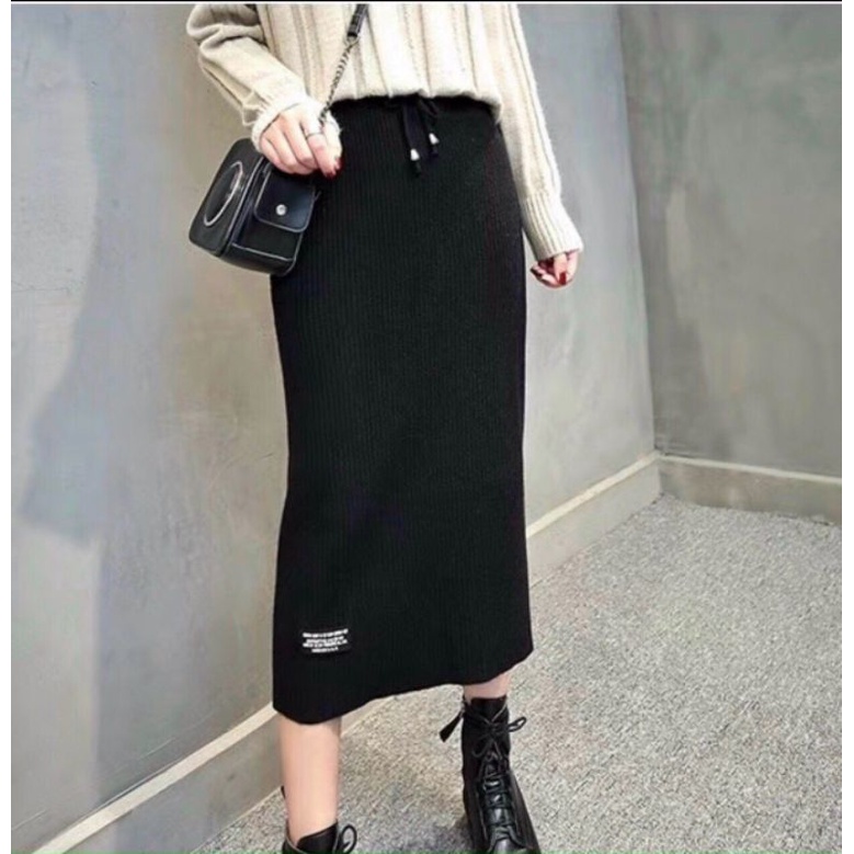 Chân váy len dáng dài QC đính logo có dây nơ