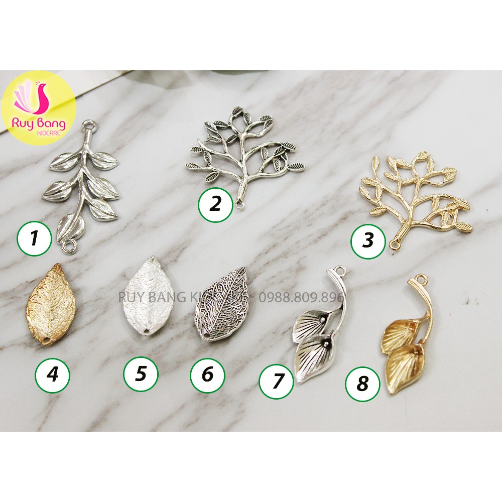 Cành lá kim loại, center đá đính hoa vải handmade