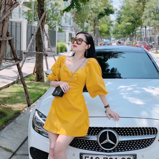 Đầm vàng cột nơ siu xinh