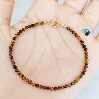 Vòng tay đá mắt hổ cắt giác 2mm