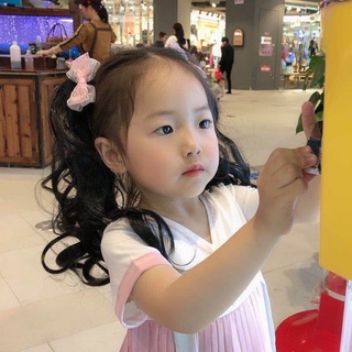 Kẹp đuôi tóc xoăn dài có nơ cho bé