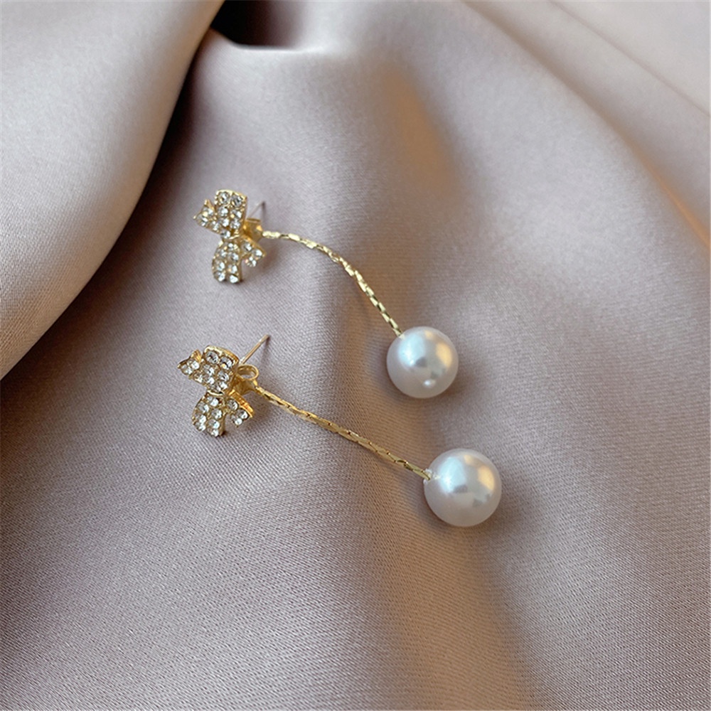 Bông tai hợp kim dáng dài đính nơ phối ngọc trai thanh lịch cho nữ