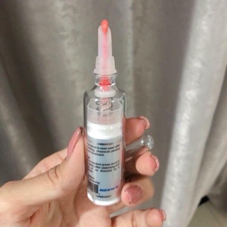 Kem khử thâm làm hồng môi nuwhite L1A Mỹ