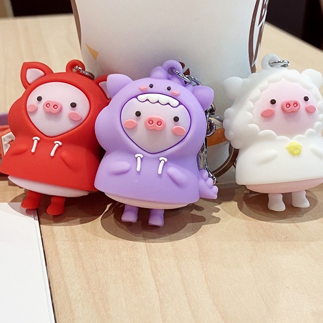 Móc Chìa Khóa Sáng Tạo Áo Mưa Hình Thú Cưng Heo Con Dễ Thương