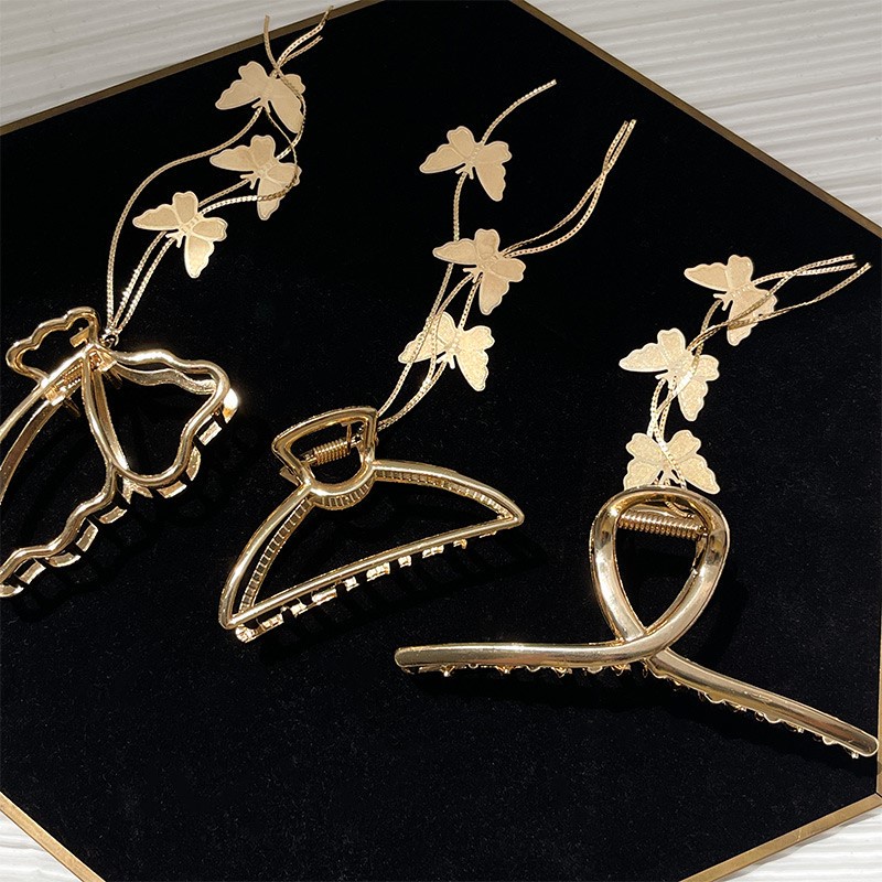 Kẹp tóc bằng kim loại hình bướm đính pha lê sang trọng