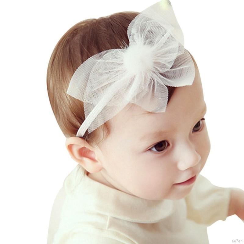 Băng đeo đầu có chi tiết quả bóng lông dễ thương cho bé
