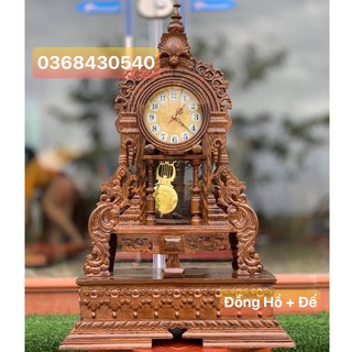 Đồng hồ quả lắc gỗ mun đuôi công