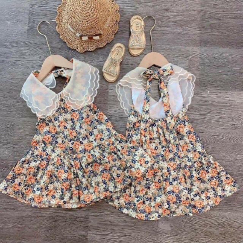 Váy bé gái thô hoa cổ ren hở lưng lẻ size xả sốc