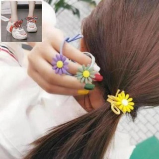-  Combo 100 Dây buộc tóc cột tóc hoa cúc