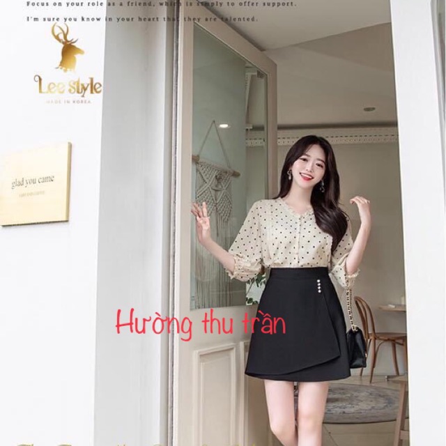 Chân váy chữ a trên gối đắp vạt che bụng trẻ trung