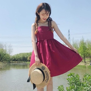 Đầm babydoll hai dây hoạ tiết thổ cẩm hở lưng