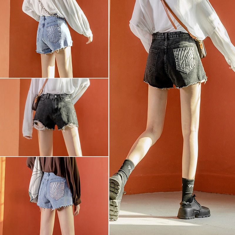 Quần Short Denim Lưng Cao Thêu Họa Tiết Bạc Phối Vết Rách Phong Cách Mới Cho Nữ