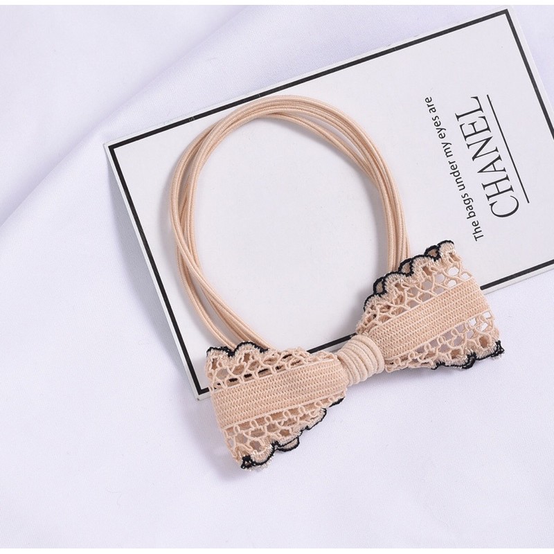 Thun buộc tóc hình nơ