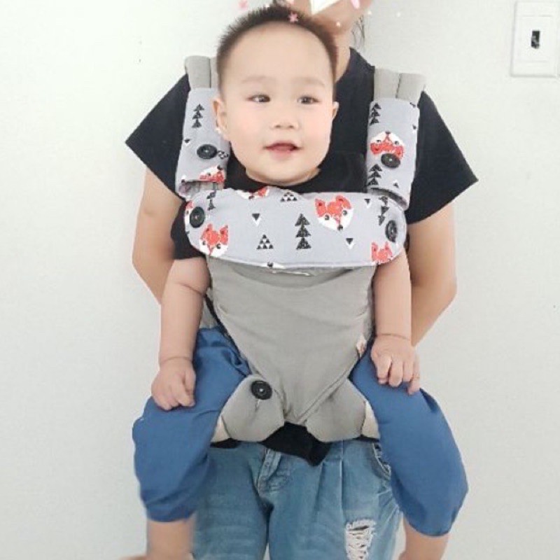 Viền cổ và bọc vai địu cho bé gặm
