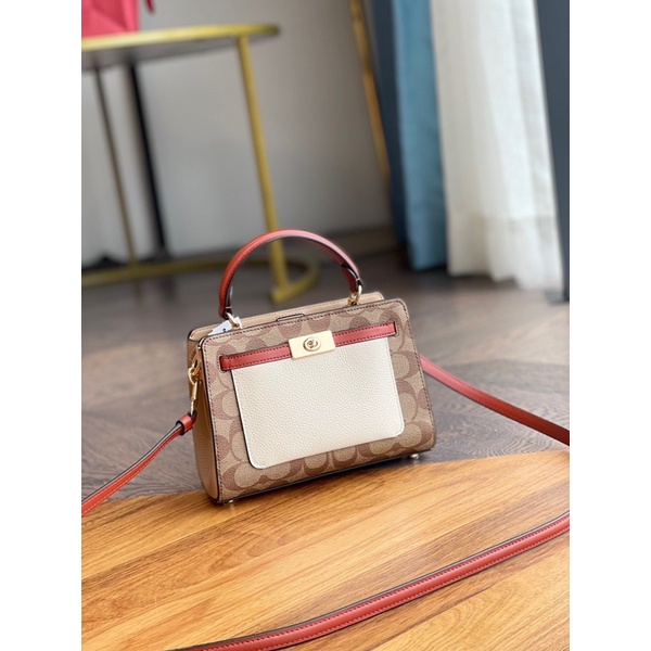 Túi cầm tay Coach Mini Lane