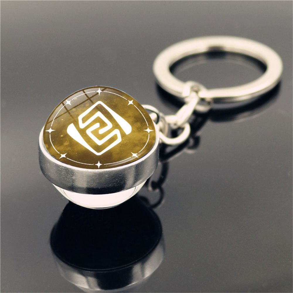 Móc khóa mặt hình quả cầu thủy tinh khắc biểu tượng game Genshin Impact phát sáng trong bóng tối