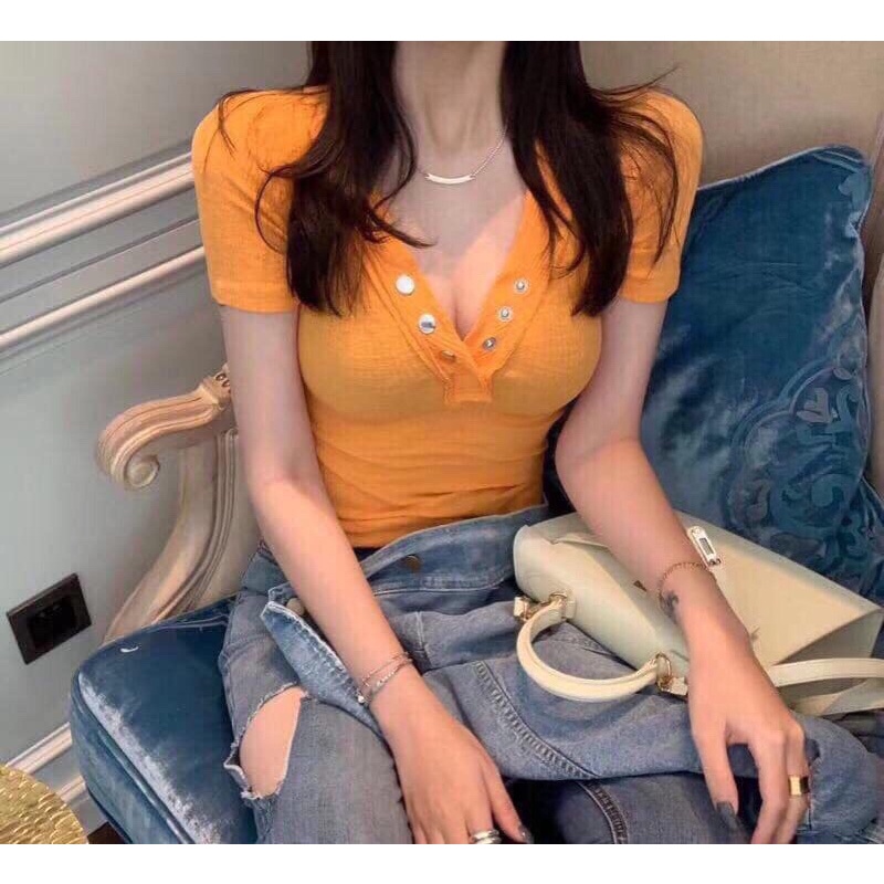 Áo tay con nút cổ