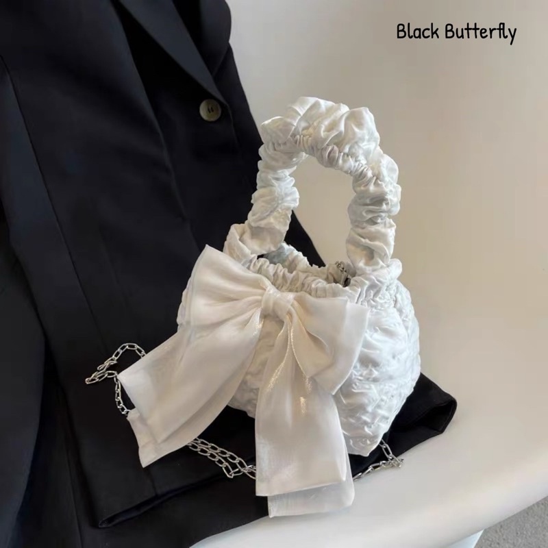 Túi đeo chéo đính nơ vải sần Butterfly