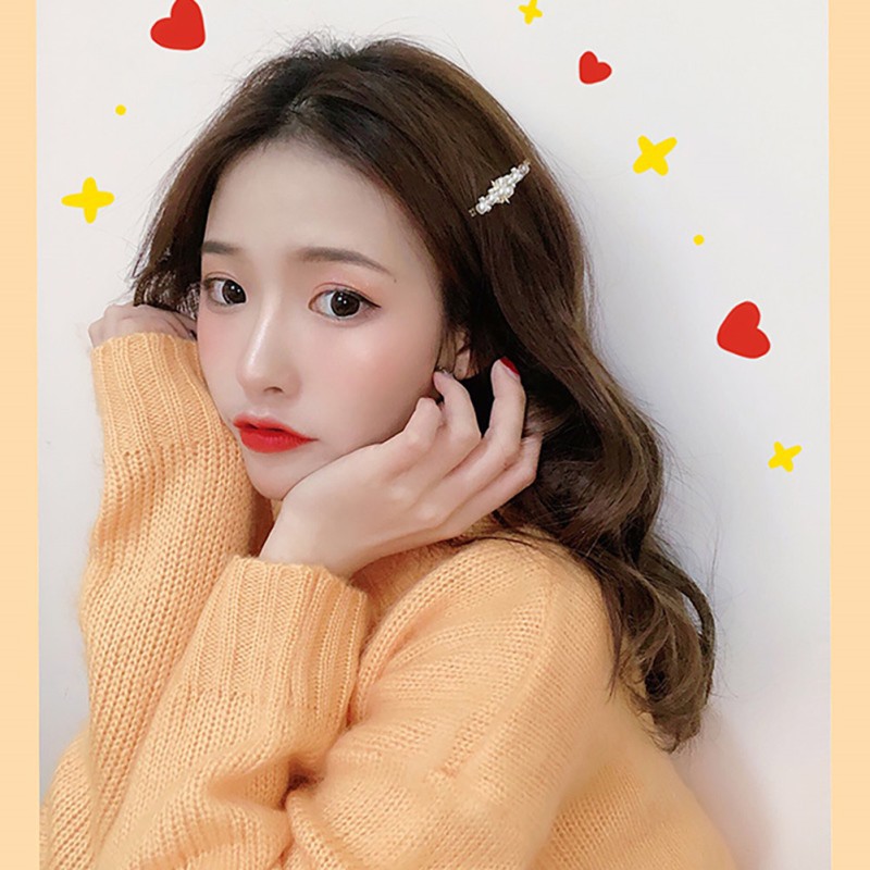 Kẹp tóc hình trái tim và ngọc trai