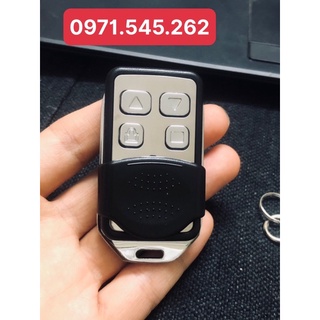 Điều khiển cửa cuốn inox tần số 433 mhz xịn, mã gạt 8 số