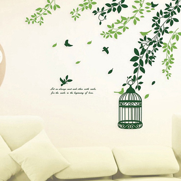 Decal trang trí tường - Những nhành cây xanh bay bay và chiếc lồng chim nhỏ